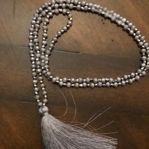 Beautiful gray and silver beaded tassel necklace.
